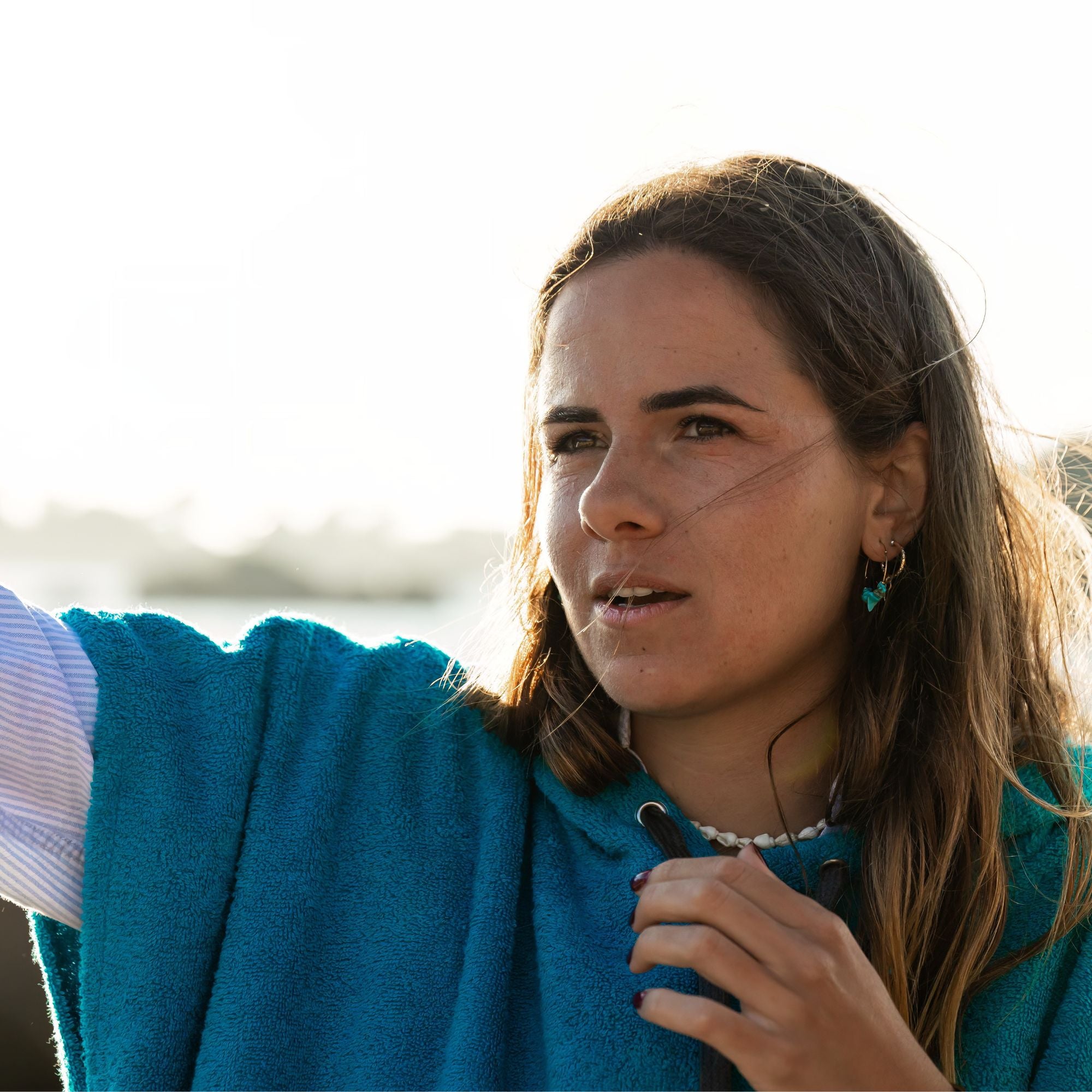 Poncho Zeus Logo Blue Poncho Zeus Surf