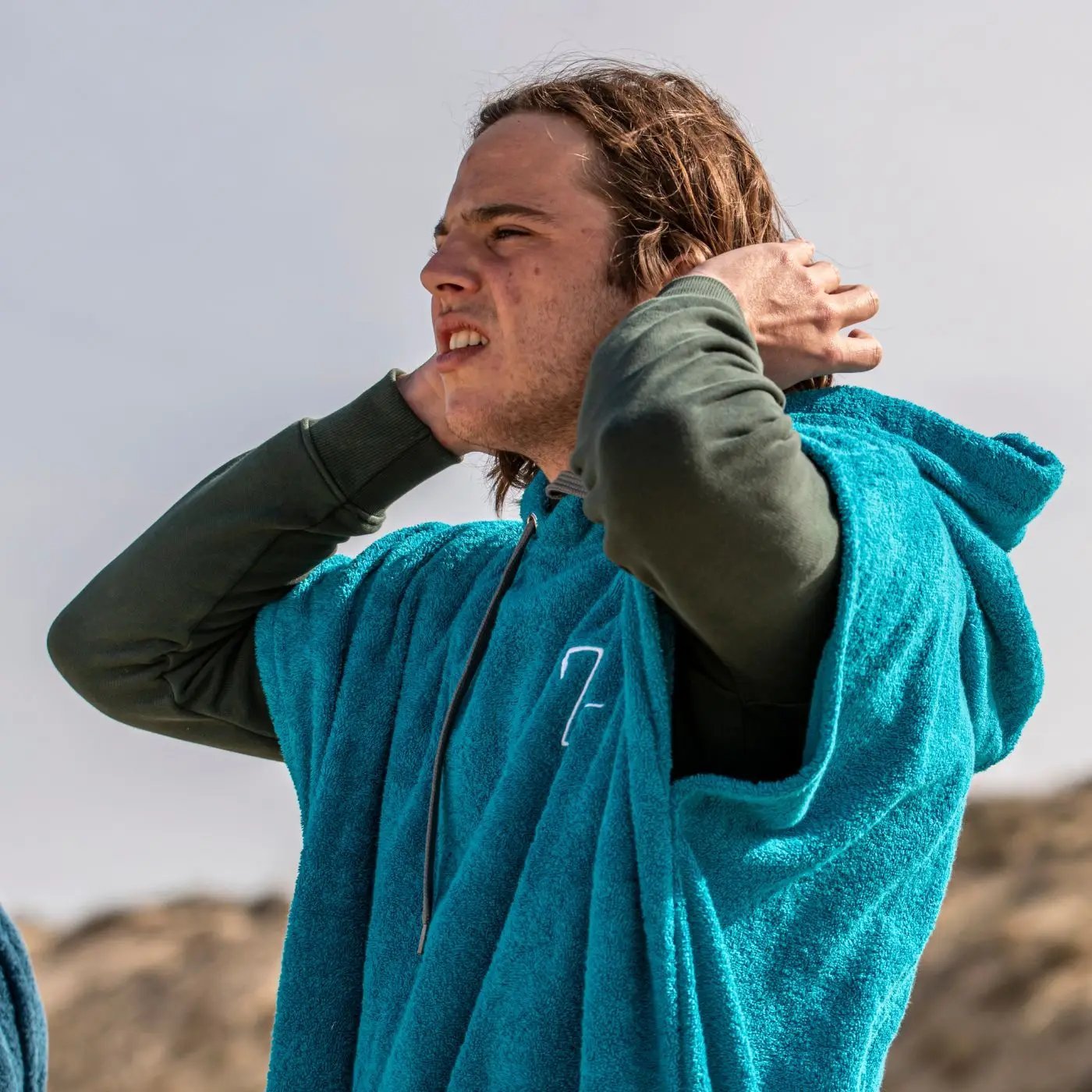 Poncho Zeus Logo Blue Poncho Zeus Surf