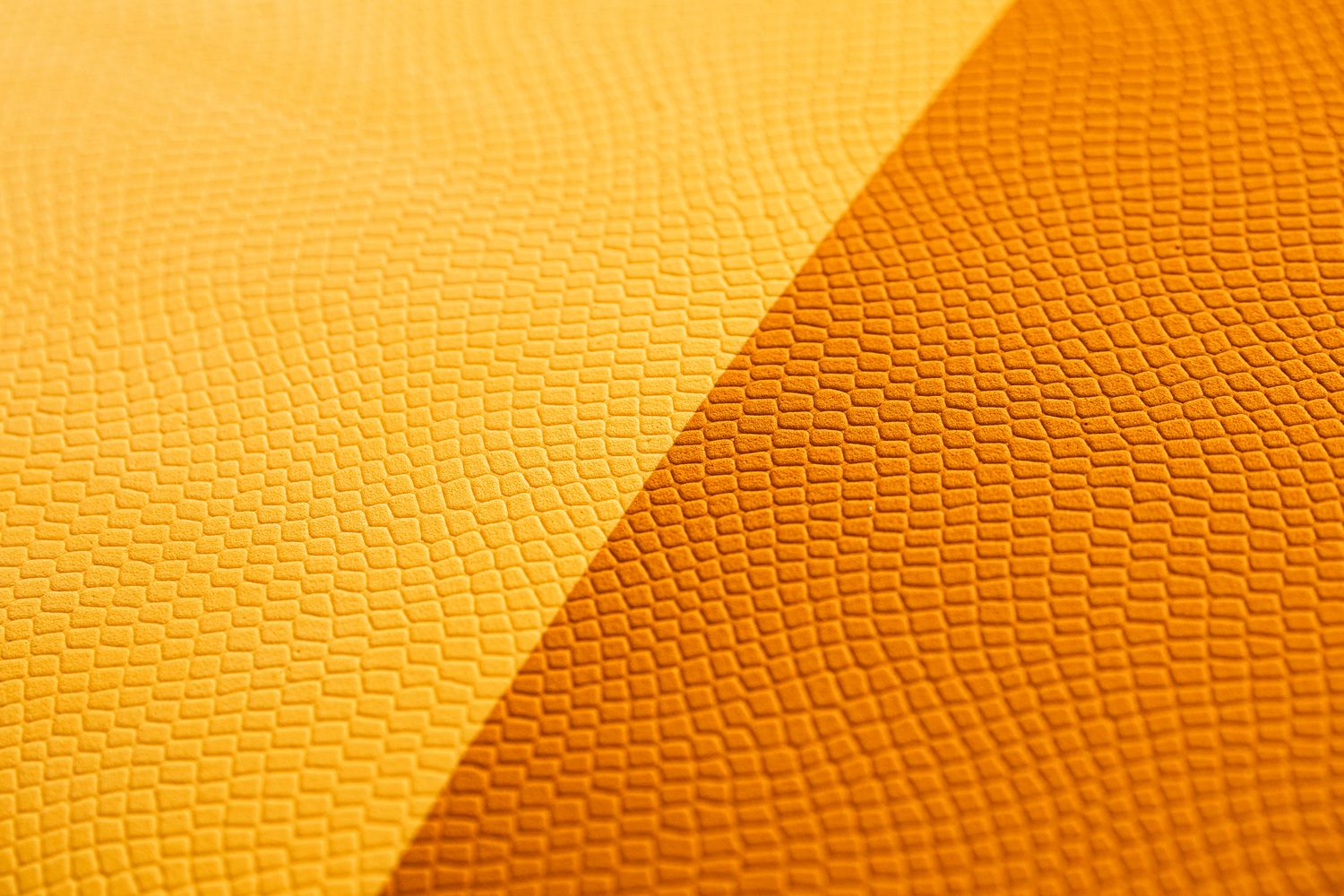 a close up of a yellow leather texture