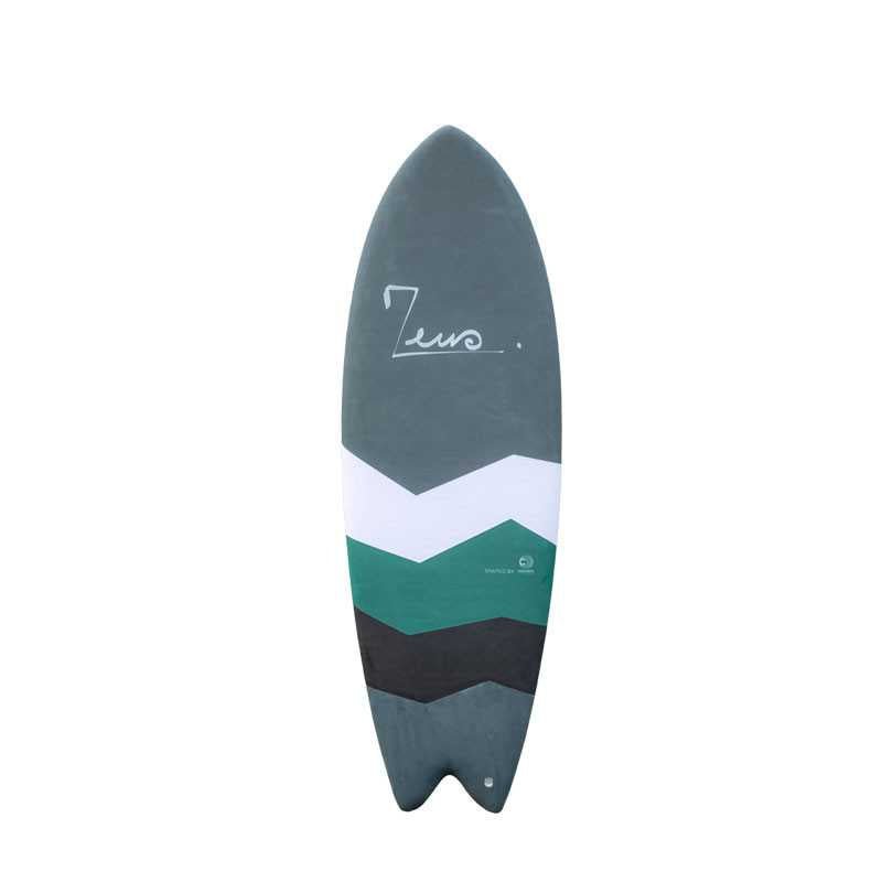 a surfboard with a green, white, and black design