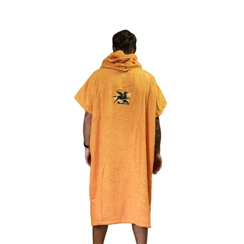 a man in an orange towel is standing